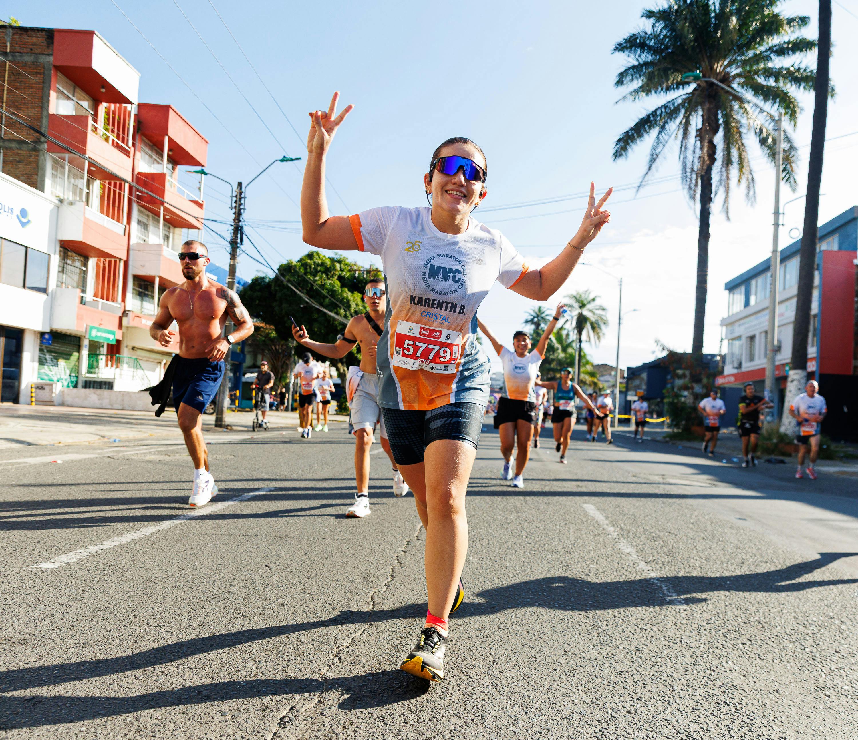 Woman celebrating during marathon race